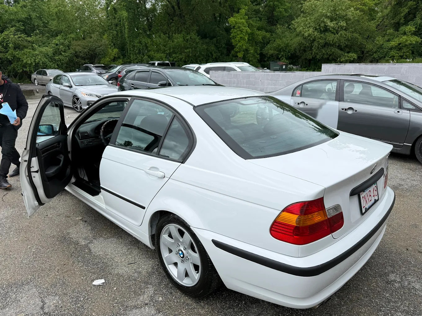 After photo of BMW 325i side profile following collision repair and paint matching in Haverhill MA