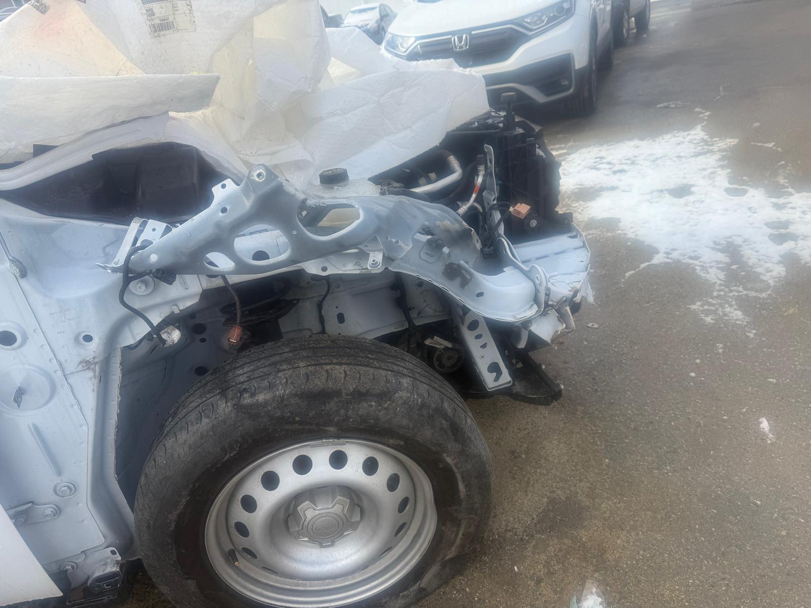 Before photo of Ford Maverick severe front-end damage at R&K Auto Body in Haverhill MA